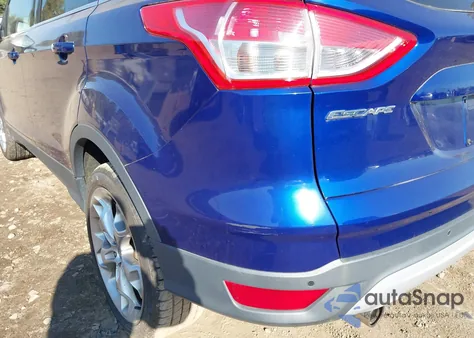 2013 Ford Escape Titanium z USA, uszkodzony, nr VIN 1FMCU0J90DUA09113